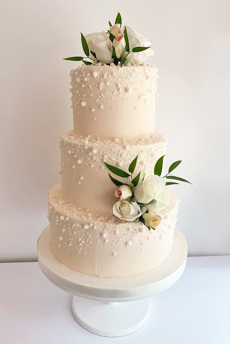 Buttercream Wedding Cake with Pearls and Roses